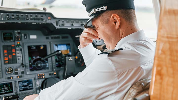 Pilot suffering from stress and fatigue